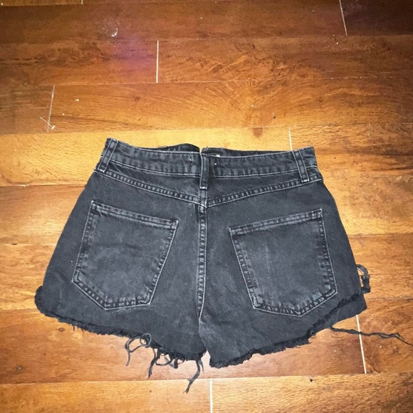 Size 26 Forever 21 high waisted black denim shorts with holes - Picture 2 of 3